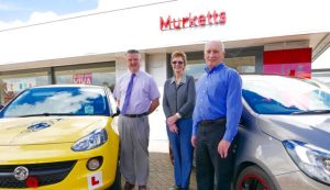 Kay and Grant with our new Vauxhall cars from Murketts
